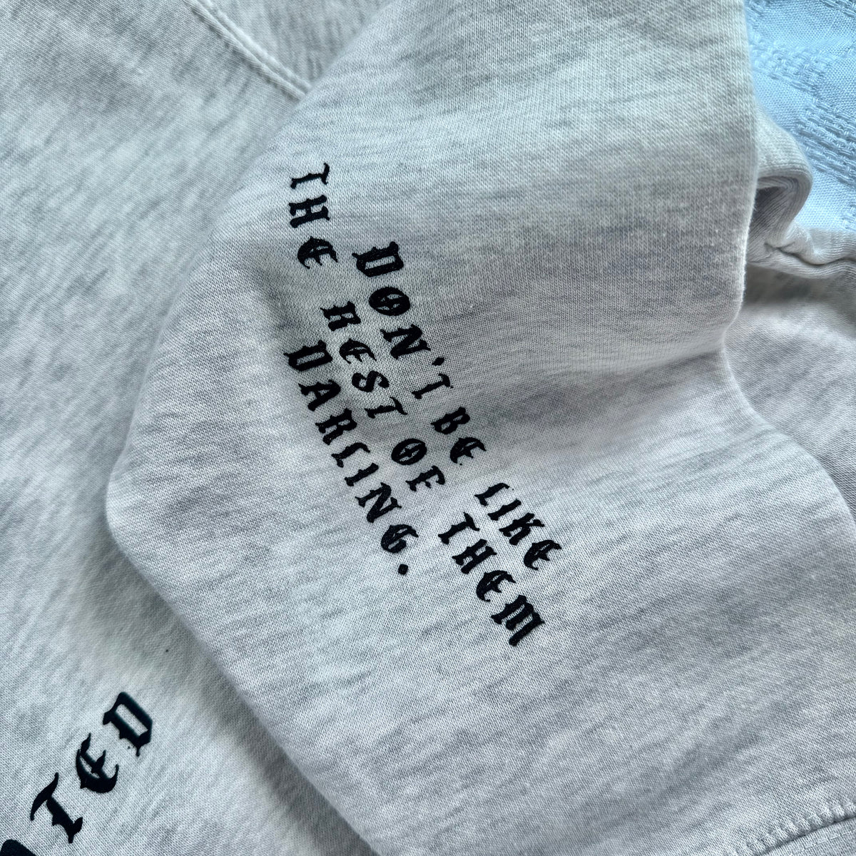 NORMAL IS OVERRATED SWEATSHIRT